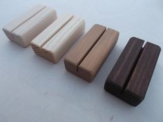 four pieces of wood sitting next to each other