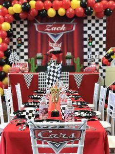 a table set up for a race car themed birthday party