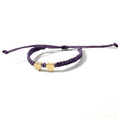 This bracelet is made of purple waterproof rope and two gold plated heart charm. Trendy Gold Friendship Bracelets For Valentine's Day, Gold Heart-shaped Braided Bracelets For Valentine's Day, Gold Heart-shaped Braided Bracelet For Valentine's Day, Trendy Adjustable Double Heart Jewelry, Gold Casual Bracelets For Valentine's Day, Casual Gold Bracelets For Valentine's Day, Trendy Purple Braided Bracelet Gift, Trendy Purple Braided Bracelet For Gift, Everyday Adjustable Double Heart Bracelet