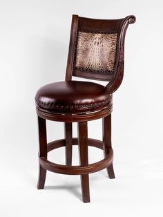 an upholstered bar stool with a leather seat and backrest in the shape of a snake skin