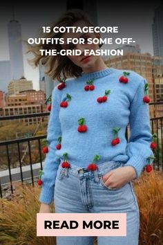 Woman in a blue sweater with cherry patterns and jeans standing in front of city skyline, promoting cottagecore fashion. Cottagecore Winter Outfits, Cottagecore Outfit, Cottagecore Outfits, Cottagecore Fashion, Cottagecore Style, Popular Fashion, Daily Routines, Autumn Dress