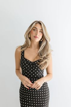 The Ellen Midi Dress is perfect for a fun and flirty date night look! This cute and playful dress features a classic black polka dot print, a flattering bustier sweetheart neckline, and a convenient back zipper closure. Perfect for a fun and flirty date night look! Details + Fit 100% Polyester Runs True to Size Machine Wash Cold Hang Dry Sweetheart Neckline Bustier Chest Sleeveless Back Zipper Closure Polka Dot Print Design Black | White | Printed Model is 5'8" and wearing a size Small Polka Dot Mini Dress, Midi Dress Black, Print Midi Dress, Printed Midi Dress, Night Looks, Polka Dot Print, Black Polka Dot, Black Midi Dress, Dot Print