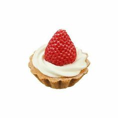 a small cupcake with whipped cream and a strawberry on top, sitting on a white surface