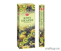 a box of kiwi grapes with blueberries and kiwis