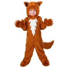 a little boy in a fox costume standing with his hands out and smiling at the camera