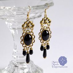 See my new & exclusive designs & get Rewardson my website www.manymoonsemporium.com(short URL www.shopmme.com)>>> Please read the full product description by clicking on "Learn more about this item" below. <<<Noble elegance is conveyed in the richly textured Marquess Xanthe earrings.  Smooth glass teardrops capped with filigree, dangle sumptuously from oval ruby red gems and antique gold swirled links.  Coordinating Xanthe necklace is available to complete the set. Also available in sapphire blu Sapphire Blue Earrings, Edwardian Necklace, Baroque Jewelry, Red Gems, Gold Chandelier Earrings, Antique Filigree, Black Onyx Earrings, Acrylic Gems, Jewel Necklace