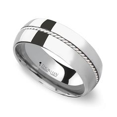 a white and black wedding ring with rope inlaying the center, on an isolated background