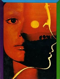 the cover of an old book with a woman's face in front of it