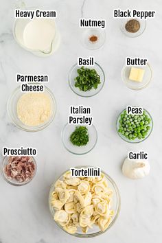 the ingredients needed to make this pasta dish are displayed on a white marble countertop