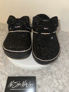 "MyStyleMyWay's  custom crocs are designed for the perfect outfit, that special occasion, and \"Just Because\" you love blinged out crocs.  In the display shown we designed a pair of Black Classic Crocs adding high quality colorful rhinestones. 🎀 Each Rhinestone is individually and neatly placed to achieve the design.  🎀Rhinestones are added to the top portion of the shoe 🎀Bows are applied to the sports mode strap to this design to add cuteness and personality.  🎀This design do not have charms, charms can be added please contact us directly or visit our website www.MyStyleMyWay.co to view our charm selection.  🎀When making your purchase - You're making a purchase for the exact style shown. If you would like a different color rhinestone,  and or different charms please message us so we Blinged Out Crocs, Crocs Custom, Shoe Bows, Bling Crocs, Classic Crocs, Custom Crocs, Harrisburg Pa, Bow Shoes, Slingbacks