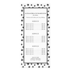 a black and white menu with paw prints on it