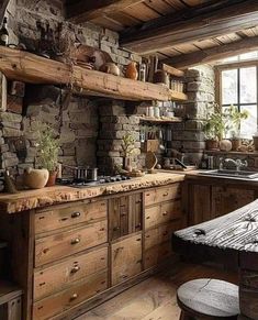 a rustic kitchen with stone walls and wooden cabinets