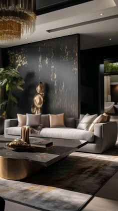 a modern living room with black walls and gold accents