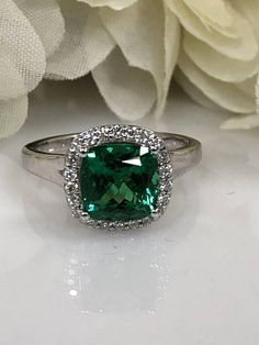 Cushion Cut Emerald And Genuine Diamond Halo Style Ring  Set In 14K White Gold #5459 Green Emerald Diamond Ring With Halo, Green Emerald Halo Ring For Promise, Green Cubic Zirconia Diamond Ring With Halo Design, Diamond Ring With Halo Setting And May Birthstone, Cubic Zirconia Emerald Ring With Halo Setting, Green Emerald Ring With Halo Design For Promise, May Birthstone Diamond Ring With Halo Setting, Green Diamond Halo Ring With Brilliant Cut, Green Emerald Halo Diamond Ring