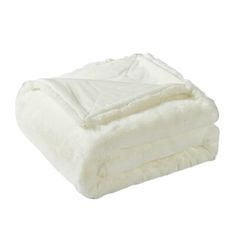 a white blanket folded on top of each other