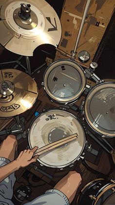 a person playing drums in front of some drum sticks