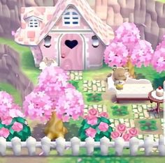 an animal house surrounded by pink flowers and trees