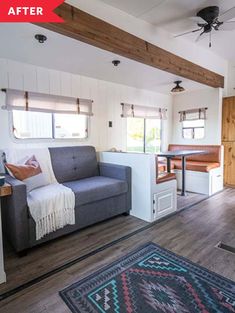 a living room filled with furniture next to a kitchen and dining area in a home