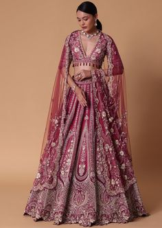 Embark on a journey of timeless elegance with our lotus motif bridal lehenga set. Crafted from a luxurious blend of red and light pink raw silk this ensemble exudes regal charm and sophistication perfect for the modern bride. Adorned with intricate lotus motifs it is completed with a stunning dori tassel back blouse. Paired with an embellished dupatta and a complementing trail dupatta this ensemble will ensure that your wedding day is nothing short of magical. Dry clean only if required. Slight variation in color is possible due to digital photography. Red Simple Lehenga Indian Bridal, Mauve And Red Outfit, Bridal Lehanga Blouses Modern Design, Magenta Bridal Lehenga, Wedding Lengha Bridal Lehenga, Indian Wedding Outfits Bridal Lehenga, Indian Bride Lehenga, Indian Wedding Lehenga Bridal, Dark Pink Lehenga