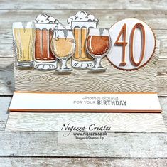 a birthday card with beer glasses and the number forty