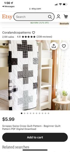 a bed with a black and white quilt on it's side, next to the website