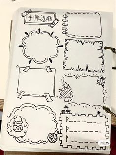 an open notebook with some doodles on it