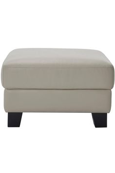 the foot stool is upholstered and ready to be used as an ottoman or bed