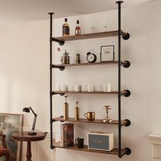 a room with a shelf filled with bottles and other items