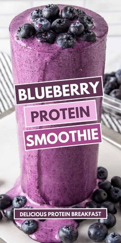 a blueberry protein smoothie on a plate with berries around it and the words, blueberry protein smoothie