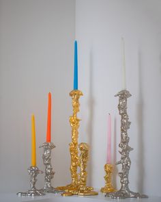 there are three candles that have been placed on top of each other in the same row