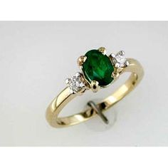 Regal 14K Yellow Gold 0.80 Carat Emerald & 0.12 Carat Diamond Ring Classic Gold Emerald Ring For Collectors, Fine Jewelry Yellow Gold Polished Emerald Ring, Luxury 14k Yellow Gold Emerald Ring, Luxury 14k Gold Emerald Ring, Elegant Yellow Gold Emerald Ring, Collectible, Emerald Diamond Ring, Emerald Stone, Royal Jewelry, Oval Cut