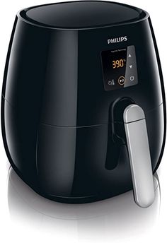 the philips air fryer is black and has an electronic timer on it's side