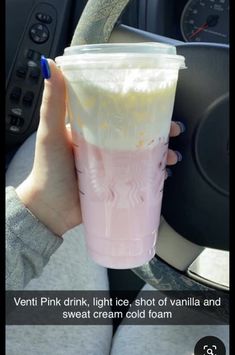 a person holding up a pink drink in their hand with the caption that reads, ventti pink light ice, shot of vanilla and sweet cream cold foam