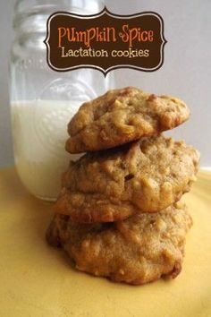 three cookies stacked on top of each other next to a glass of milk