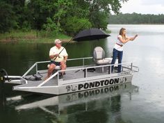 two people on a pontoon boat in the water