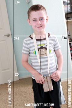 a young boy wearing a monkey t - shirt and suspenders