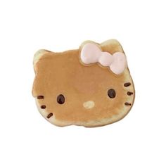 a cookie shaped like a hello kitty with a bow on it's head