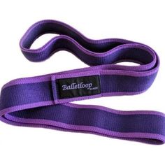 a purple belt with black logo on the front and bottom, it has a metal hook