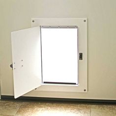 an open door on the side of a wall