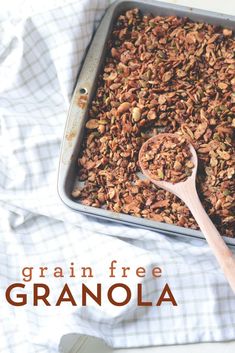 granola in a baking pan with a wooden spoon on the side and text overlay that reads grain free granola