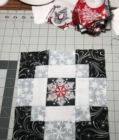 the quilts are being sewn together to make a snowflake ornament