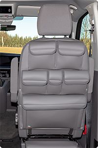 the interior of a vehicle with grey leather seats