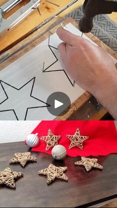 someone is making christmas ornaments out of wood