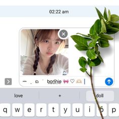 an image of someone's face on the keyboard with flowers in front of them