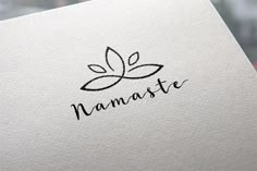 the logo for namaste is shown on a piece of paper