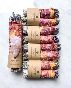 six bundles of dried flowers wrapped in twine