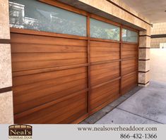 a brown garage door on the side of a building