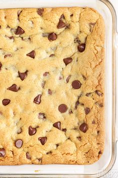 a chocolate chip cookie in a glass baking dish