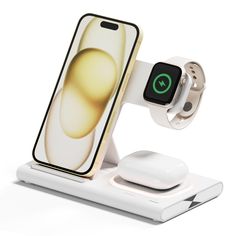 an apple watch and wireless charging station on a white surface with the phone in it's holder