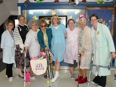 a group of women standing next to each other with crutches